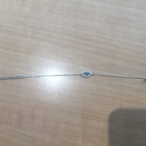 Bracelet argenté avec œil bleu