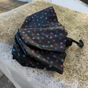 Parapluie pliant noir à motifs colorés